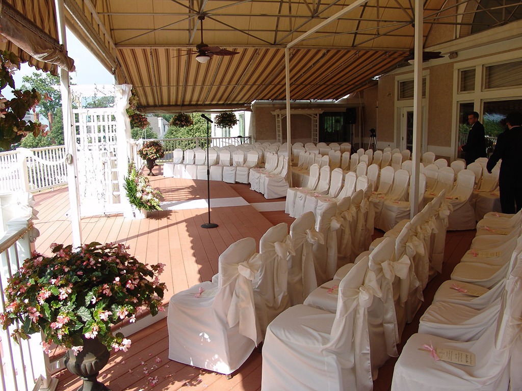 wedding ceremony set up on country club patio