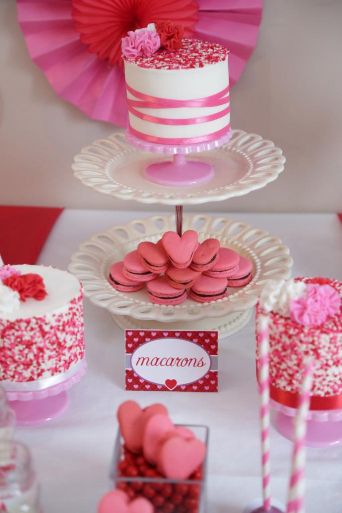 Valentines themed sweet 16 with pink cake and macarons