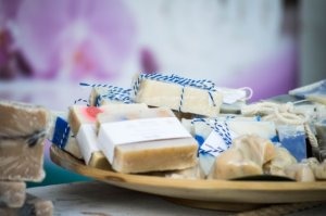 plate of custom scented soaps wrapped for party favors 