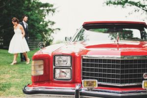 luxury, classic red car for wedding transportation
