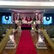 PineCrest's ballroom decorated with traditional Indian wedding sofas for South Asian pre-wedding celebrations.