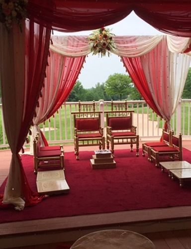 An Indian wedding ceremony setup at PineCrest's Deck overlooking the golf course in Lansdale, PA
