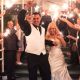 bride and groom celebrating wedding surrounded by sparklers at Pinecrest Country Club in Montgomery County PA 