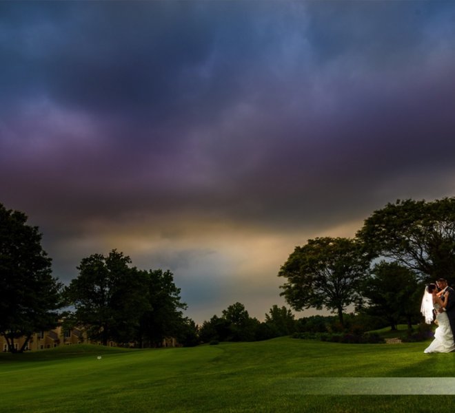 bride and groom at sunset on the golf course at Pinecrest Country Club, elegant wedding venue in Lansdale PA 