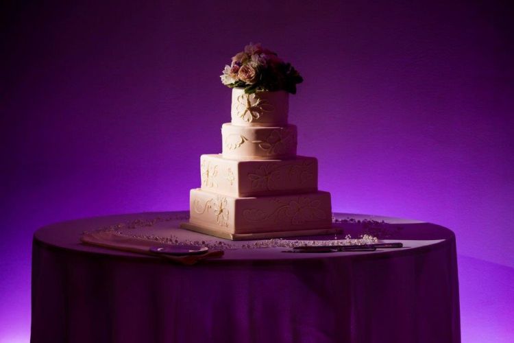 Four tier white wedding cake for celebration at PineCrest in Lansdale, PA