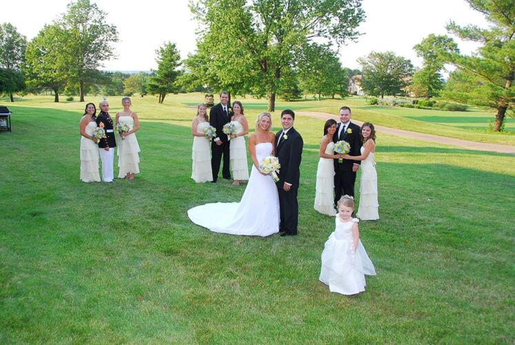 Bridal party poses for photographs at PineCrest's wedding reception venue and golf course