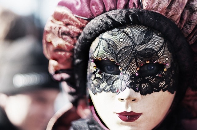 woman in masquerade party mask