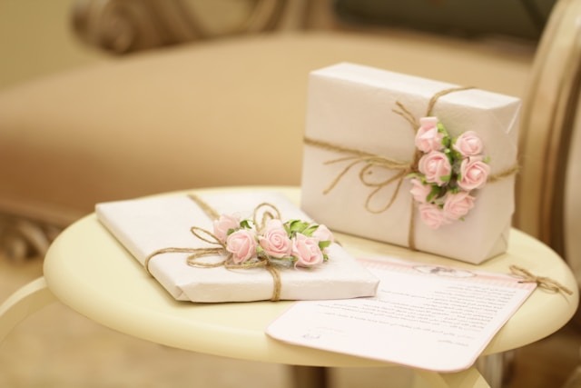 2 white boxes with pink flowers