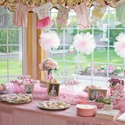 Pink themed baby shower decorations