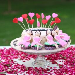 cake with hearts surrounded by flower petals