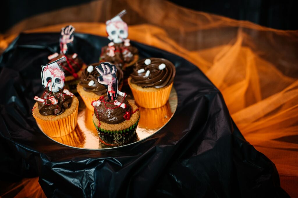 Halloween-themed chocolate cupcakes on a plate
