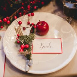 christmas themed wedding table decor with card saying bride