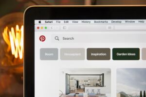 Laptop opened on Pinterest party planning app