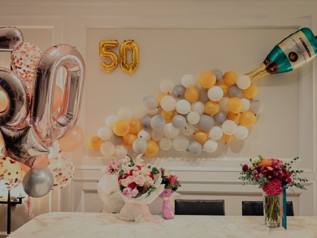 50 year old adult birthday party with balloons and other decorations
