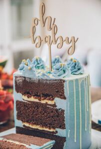 Baby shower chocolate cake with blue icing