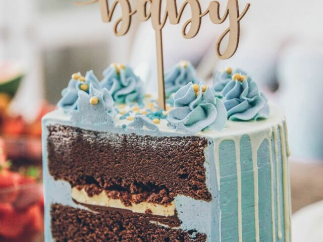 Baby shower chocolate cake with blue icing