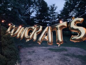 Balloons spelling out “Congrats” for a graduation party