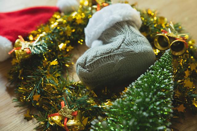 baby booties in a Christmas wreath